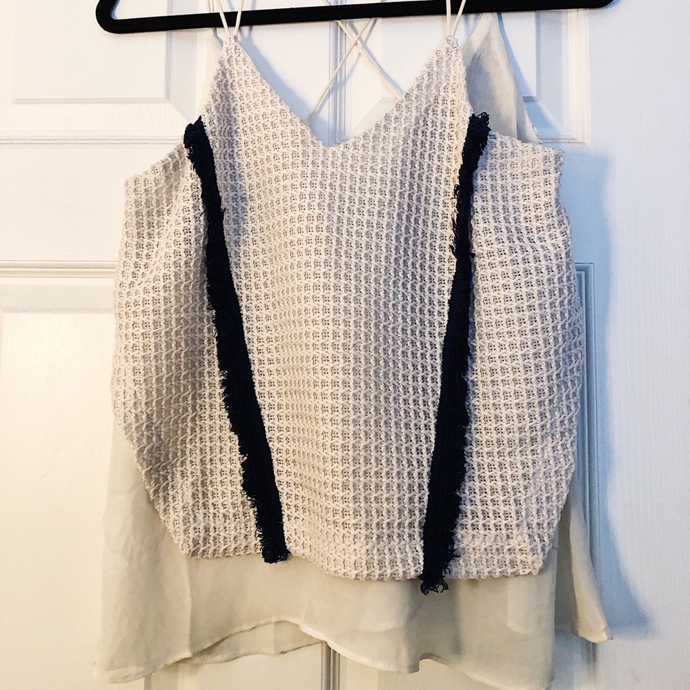 tan top with blue fluff